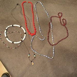 Lot 6 beaded necklaces.The small white with navy blue beads is more of a choker.